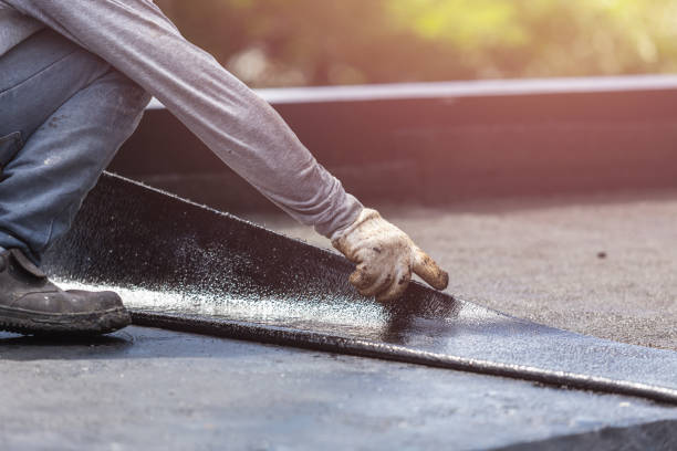Professional Exterior Waterproofing technician working in Freeport, NY